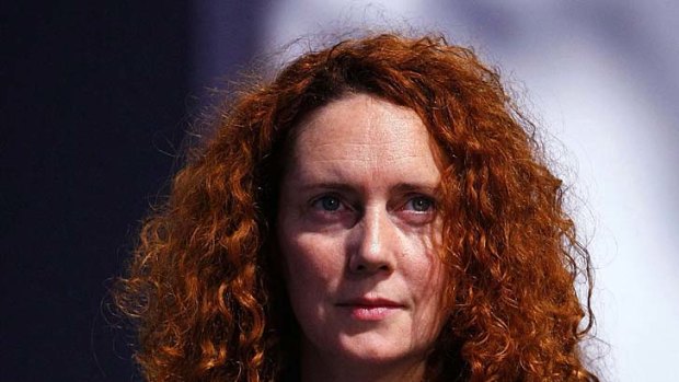 Rebekah Brooks ... James Murdoch is standing by her.