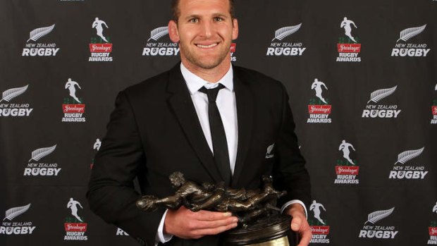 All Black Kieran Read with the Kelvin R Tremain Memorial Player of the Year trophy.
