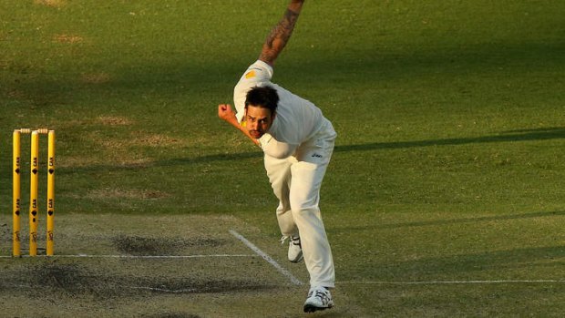 Lethal leftie: Mitchell Johnson fires down another thunderbolt in Brisbane.