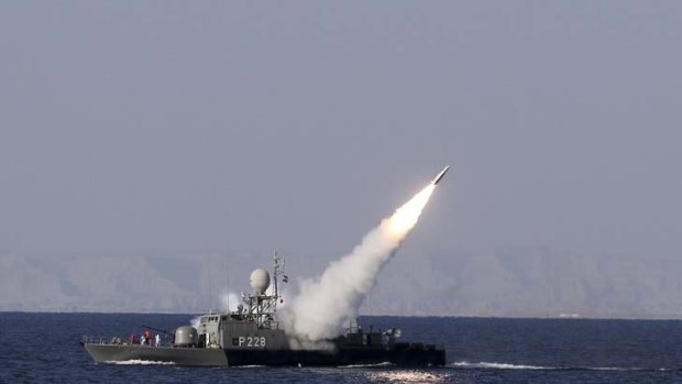 A new medium-range missile is fired from a naval ship during Velayat-90 war game on Sea of Oman near the Strait of Hormuz in southern Iran.