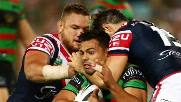 South Sydney forward Ben Te'o is sandwiched by the Roosters defence in round one.