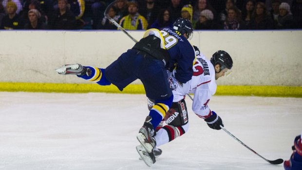 The Canberra Brave's Kelly Geoffrey attacks the puck in his team's opening game of the season against the Sydney Bears.