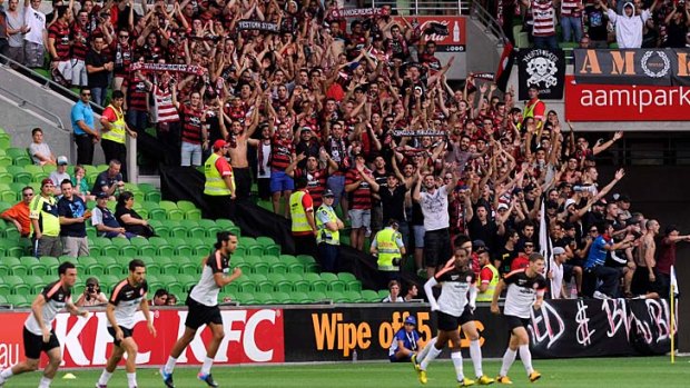The Western Sydney Wanderers get a welcome from their fans at AAMI Park.