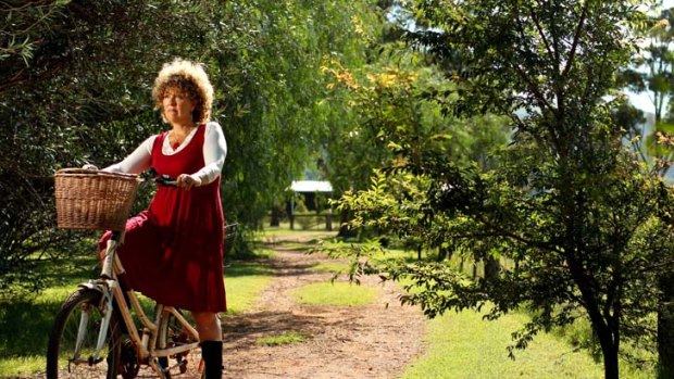 ''There was no victim in my particular Australian crime'' &#8230; a helmetless Sue Abbott with her bike on her Scone property.