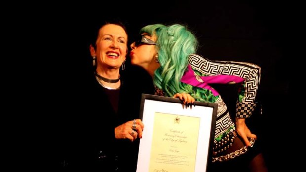 Lord Mayor Clover Moore presents Lady Gaga with a certificate of honorary citizenship to the city of Sydney.