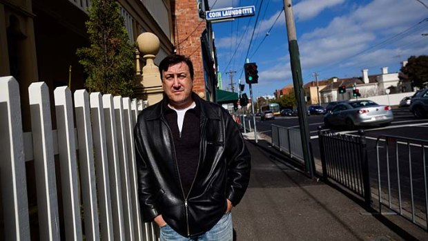 Punt Road resident and action group spokesman Andrew Carrasco outside his property.