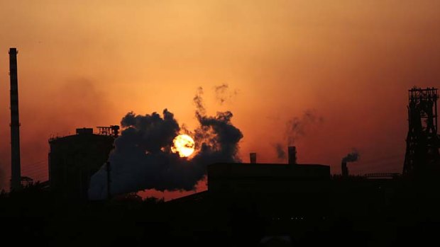 Sunset industry ... the ILVA steelworks dominate the skyline in Taranto, Italy. Its employees, whose tumour rate is 10 times the national average, want it kept open.