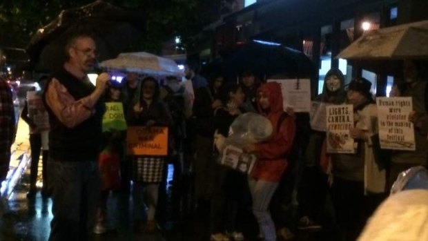 Pro-Palestinian crowds protest outside Palace Centro James Street cinema at New Farm.