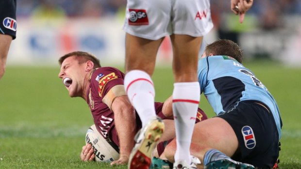 Brent Tate screams in agony after injuring his leg in Origin last month.