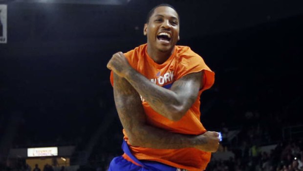 New York Knicks forward Carmelo Anthony celebrates in the last seconds of the Knicks' 103-102 victory over the Boston Celtics in a preseason NBA basketball game in Providence last week.