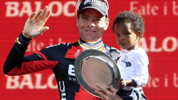 Third place finish: Cadel Evans with his son Robel on the podium after the last stage of the Giro d'Italia.