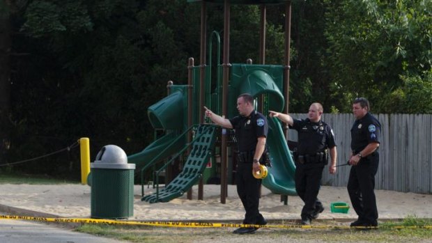 Kentwood police investigate the stabbing of a 9-year-old boy that occurred in a playground in Pinebrook Village, in Kentwood, Michigan.