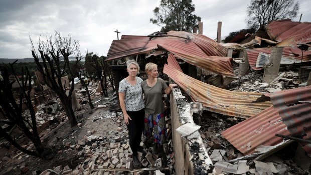 Deborah Naeve and partner Ingrid Mitchell return to their home in Tathra which was burned down in the bushfire on the NSW south coast.