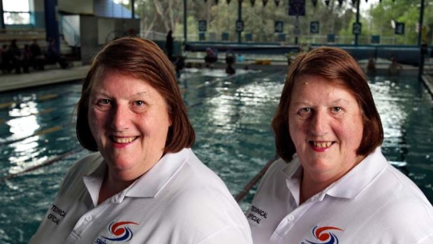 Judith (left) and Janice Smith, identical twins who have been swimming officials for 45 years, have been honoured with OAMs.