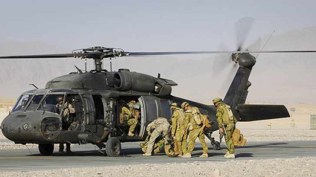 Black Hawk ... Australian soldiers boarding the US chopper in Afghanistan in 2009.