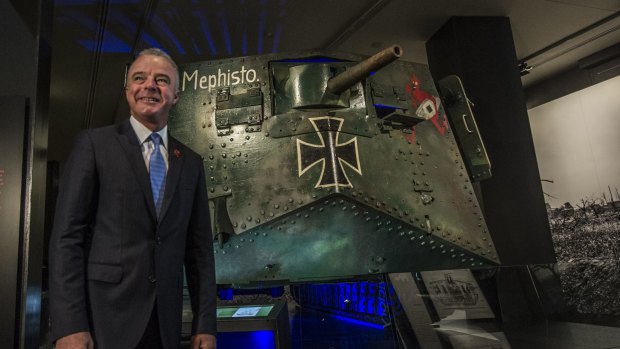 Dr Brendan Nelson, director of the Australian War Memorial, looks at the rare German tank Mephisto now on display at the Australian War Memorial.