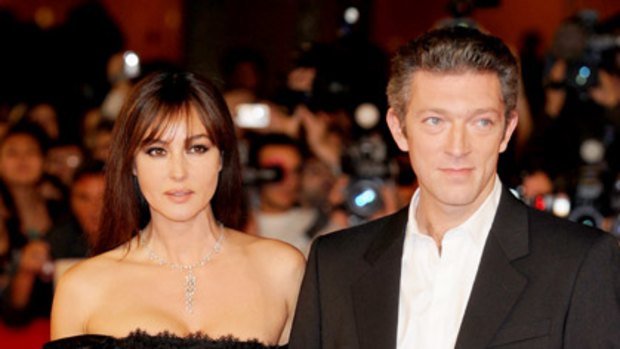 Down to earth ... Monica Bellucci with husband Vincent Cassel.