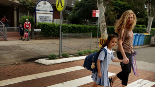 Thinking outside the square ... Joy Poulos picks up her daughter from primary school in Blakehurst.