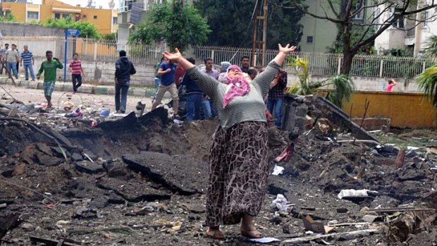 Volatile situation: Anger and grief in Reyhanli after the town is rocked by explosions.