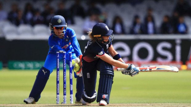 England's Lauren Winfield is bowled by India's Rajeshwari Gayakwad during the Women's World Cup Final at Lord's on Sunday.