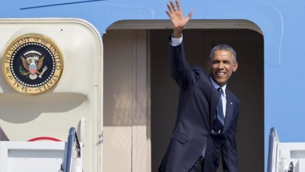 US President Barack Obama boards Air Force One for a trip to Estonia.