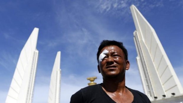 Boonying Manjit, who said he was wounded in a gun and grenade attack on Thursday at the Democracy Monument in Bangkok. Five people were reported killed in the attack on an anti-government protest camp.