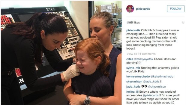 Instagram shot of Roxy Jacenko and daughter Pixie Rose as she gets her ears pierced.