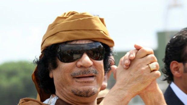 Warning ... Muammar Gaddafi arrives in Rome.