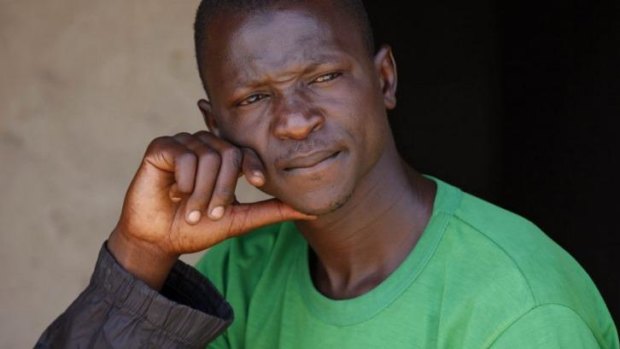 Looking for another wife: Mahammadu Saidu, the former husband of Maimuna Abdullahi, sits outside his home in Kaduna, Nigeria.