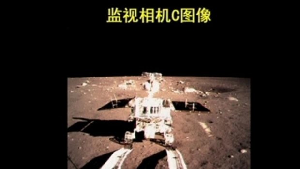 China's first moon rover: Yutu, or Jade Rabbit, moves onto the lunar surface in this still image taken from video provided by China Central Television.