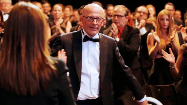 French director Jacques Audiard reacts after being awarded with the Palme d'Or.