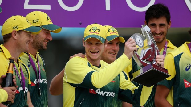 Steve Smith celebrates with his team after claiming the one-day series against England at Old Trafford on Sunday. 