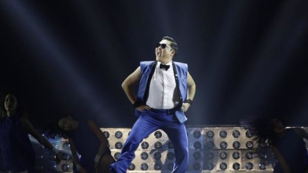 Psy on stage performing <i>Gangnam Style</i>.