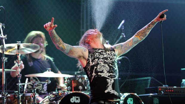 As I Lay Dying singer Tim Lambesis performing at the 2010 Revolver Golden Gods Awards.