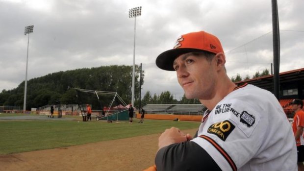 Michael Collins will manage Canberra Cavalry again in 2014-15.