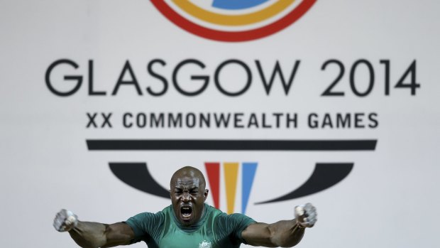 Disgusted: Australian lifter Simplice Ribouem was hoping for a gold souvenir for his son.