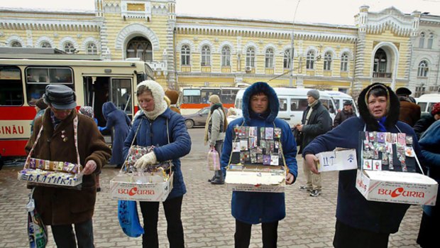 Moldovan people sell traditional spring gifts in downtown Chisinau.