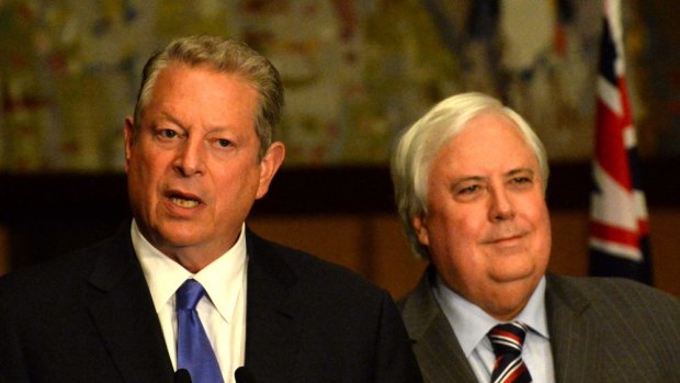 Clive Palmer, right, announces climate policy flanked by former US vice-president Al Gore.