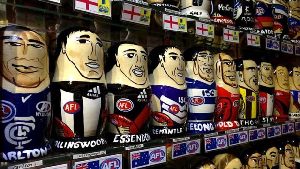 Funny faces ... Babushka dolls of every AFL club on sale in Prague.