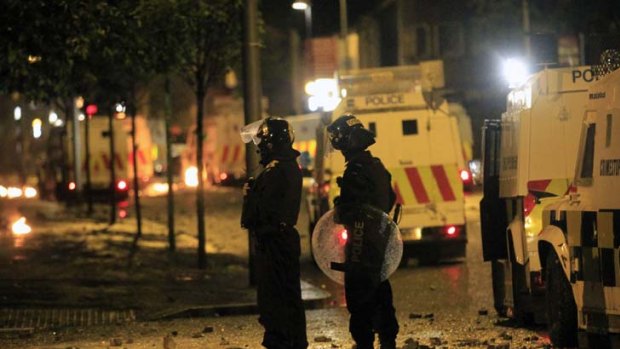 Northern Ireland police officers patrol in east Belfast, after a second night of rioting between Catholic and Protestant groups.