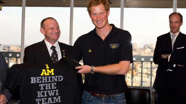 Prince Harry greets the New Zealand Invictus team in London on Monday.