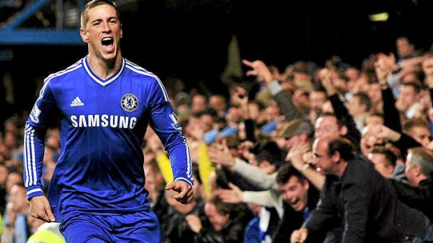 Fernando Torres celebrates after scoring the winner for Chelsea.
