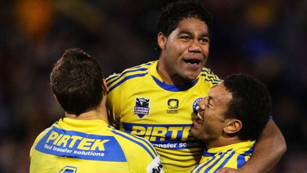 Something to cheer about ... Chris Sandow eases some of the pain of a difficult year with the winning field goal in extra time.