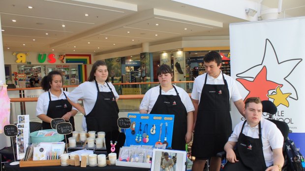 Newcastle Senior School students selling their Chances products at a pop-up shop.
