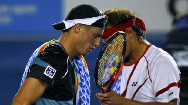 Here we go again ... Lleyton Hewitt and David Nalbandian had another epic Australian Open struggle.