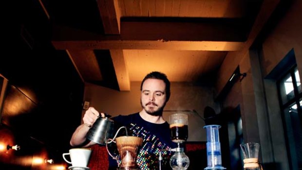 A not-so-simple pleasure ... Anthony Svilicich uses a variety of techniques to prepare exotic brews at Le Monde in Surry Hills yesterday.