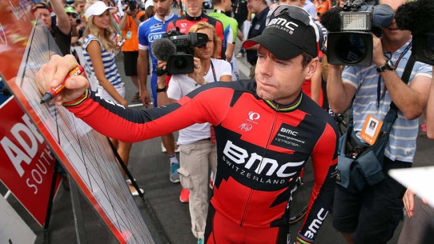Marquee: Cadel Evans signs on before stage 2 of the Tour Down Under from Prospect to Stirling in South Australia on Wednesday. The Tour clashes with the lower-ranked but cashed-up Tour de San Luis in Argentina.