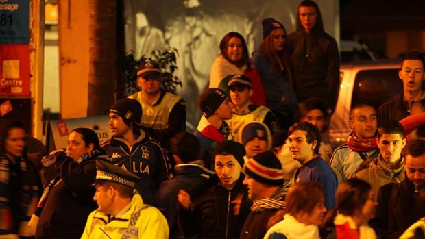 On the losing side ... Italy football fans watch the final at Norton Street, Leichhardt.