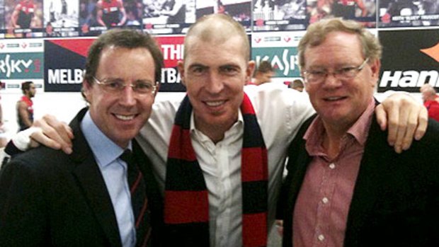 Cameron Schwab with Demons president Jim Stynes and his deputy Don McLardy.