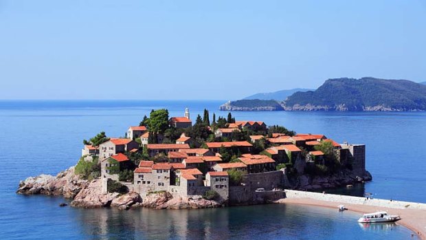 Instantly recognisable ... Sveti Stefan - the beautiful little islet off the Adriatic just south of Budva, connected to the mainland by a small isthmus.